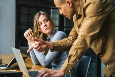 Creative professionals receiving constructive creative feedback