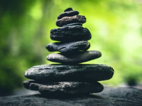 a graceful pile of stones in a peaceful zen garden