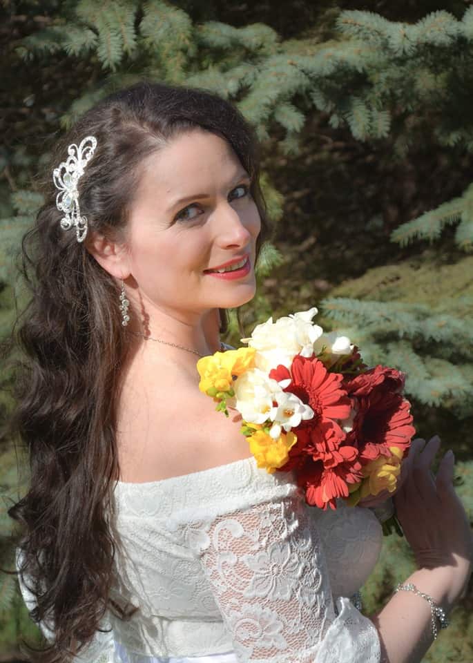 The beautiful bride with flowers after our wedding