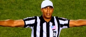 football referee making no good hand signal