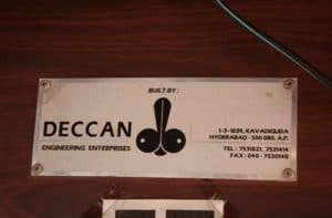 this logo for deccan engineering shows a rocket that looks like a penis and testicles