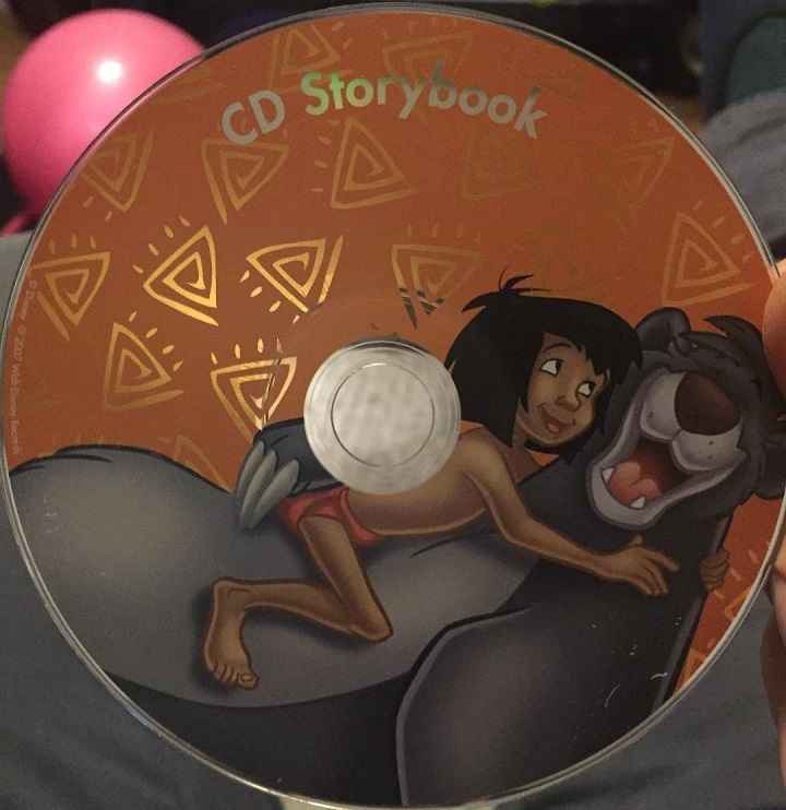 Triangle symbols on a compact disc for Disney's Jungle Book