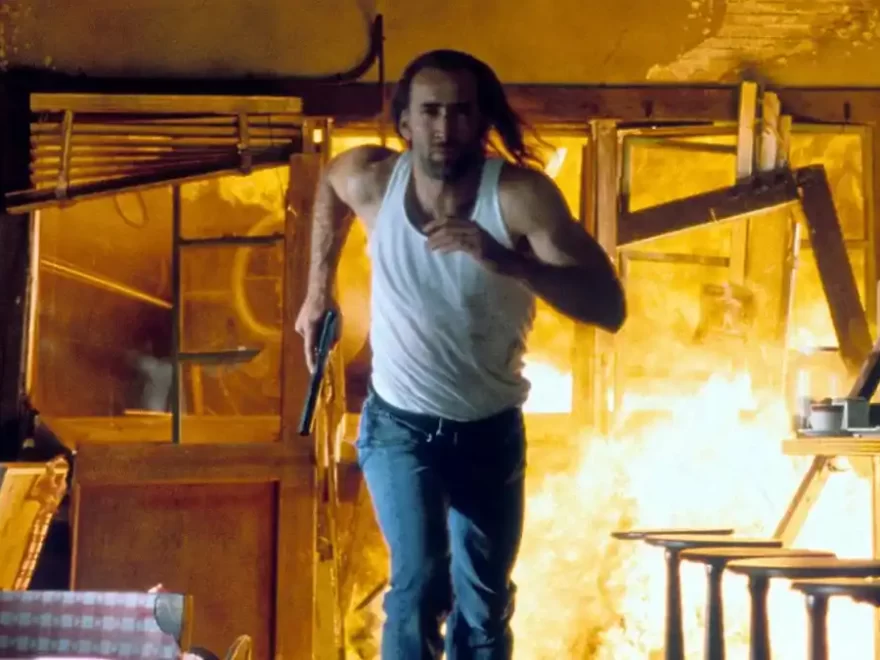 Nick Cage running from an exploding building